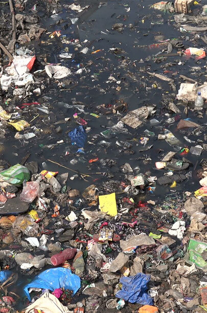 clean drinking lake and river water contaminated by trash garbage and chemicals