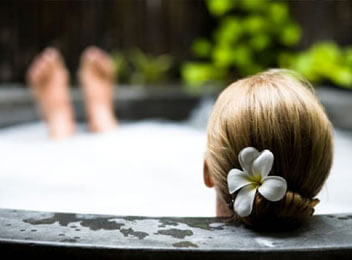 woman taking comfortable and luxurious bath